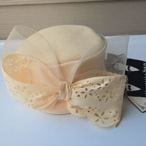 Whittall & Shon Elegant Cream Bow Hat